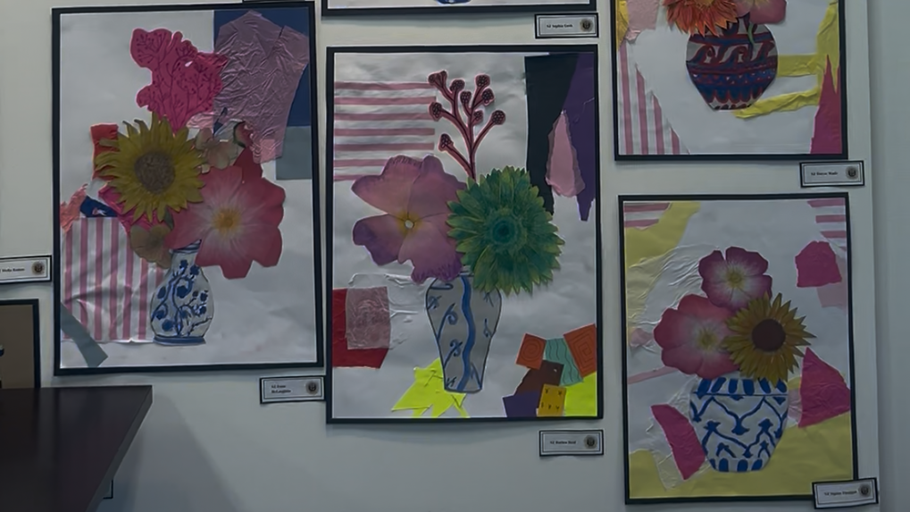 Three artworks of vases with flowers created by pupils from St Matthews Academy
